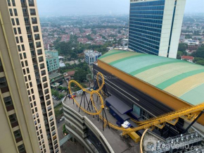 Nice and Comfort 2BR at Transpark Cibubur Apartment By Travelio